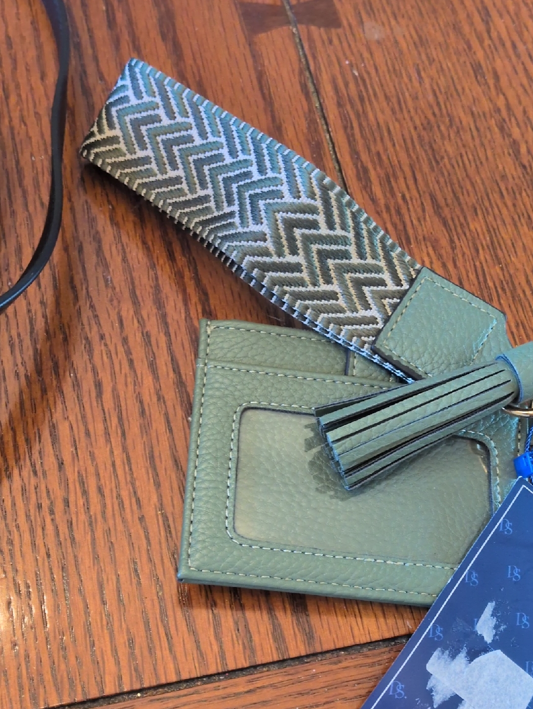 Green Leather Card Holder With Tassel And Patterned Strap